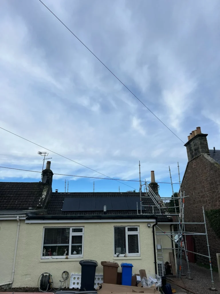 Solar panels installation on roof with scaffolding in Cuppar Fife